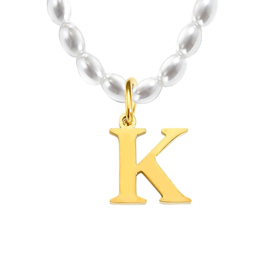 Elora Pearl Initial Necklace, shown on a plain background 3