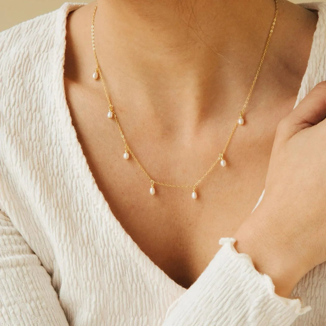 Sita Pearl Necklace, worn at the neckline