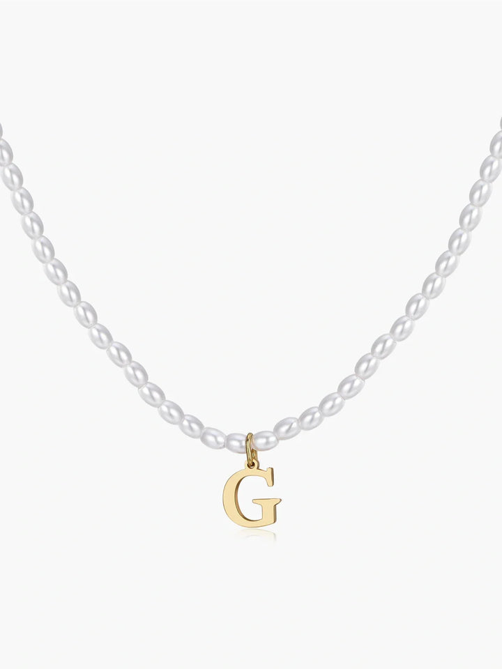 Elora Pearl Initial Necklace, shown on a plain background