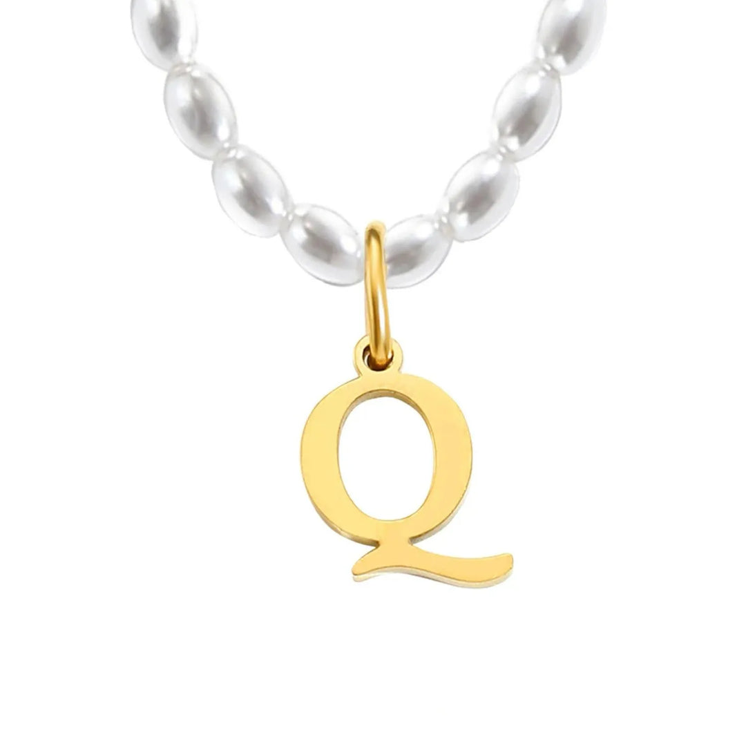 Elora Pearl Initial Necklace, shown on a plain background 4