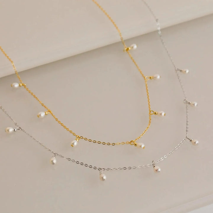 Sita Pearl Necklace, close-up while worn