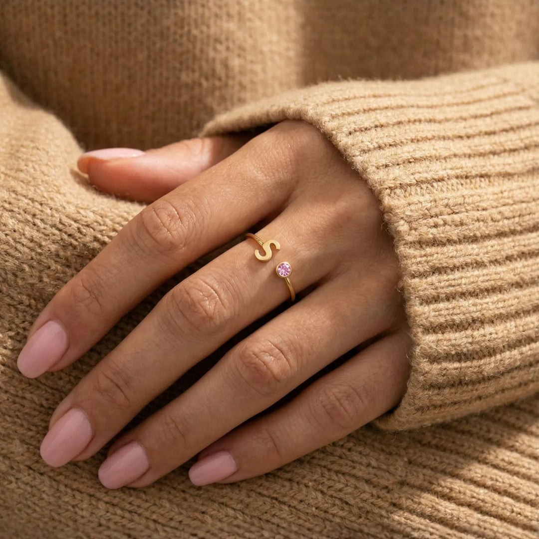Bond Adjustable Initial and Birthstone Ring in gold, shown on the model