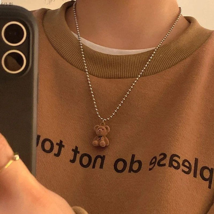 Plush Bear Necklace, worn at the neckline