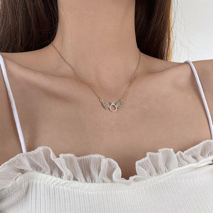 Angel Wings Ring Necklace, styled on the model