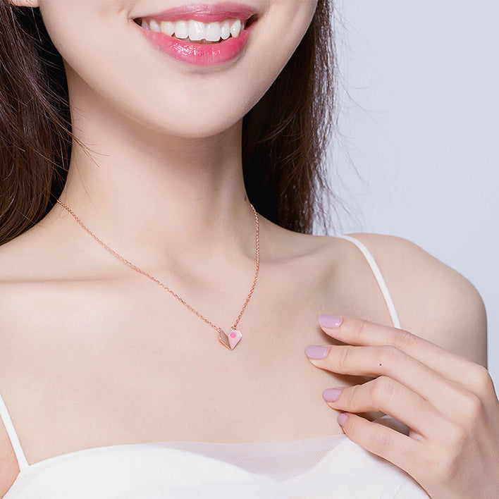 Origami Heart Necklace, worn at the neckline
