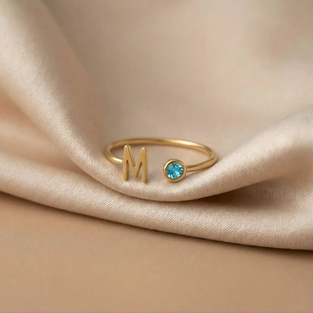 Bond Adjustable Initial and Birthstone Ring in gold, worn, side view