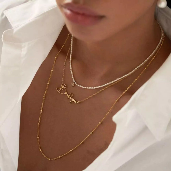 Connection Name Necklace, worn at the neckline 2