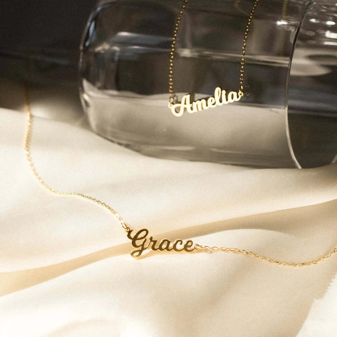 Firma Name Necklace, shown on the model