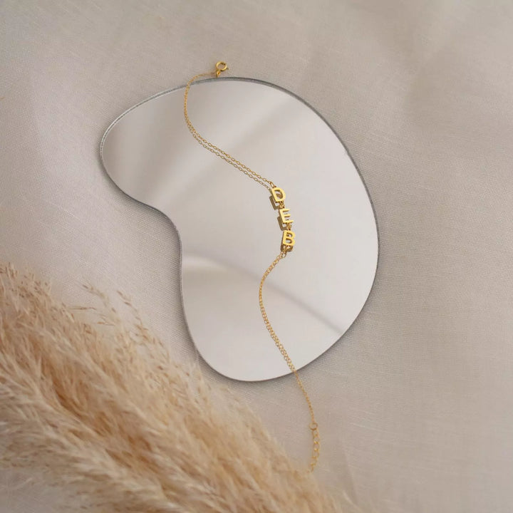 Golden Bond Name Bracelet, worn, side view