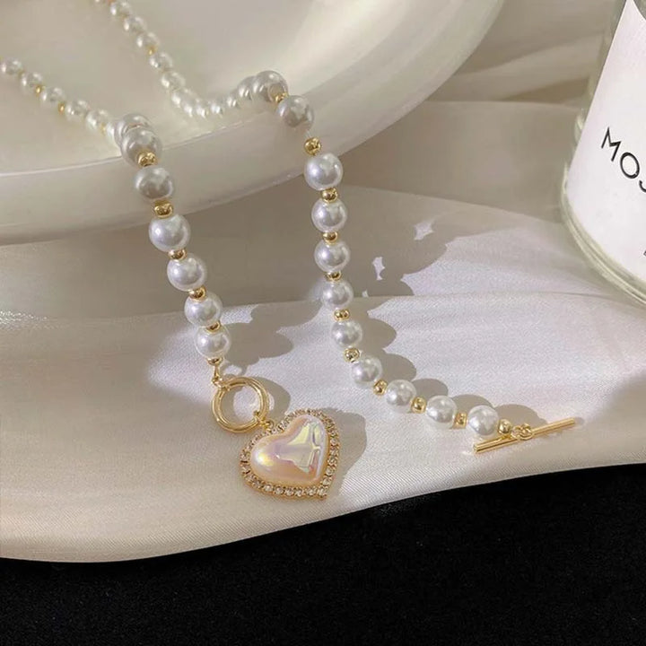Heart Pearl Necklace, shown on the model