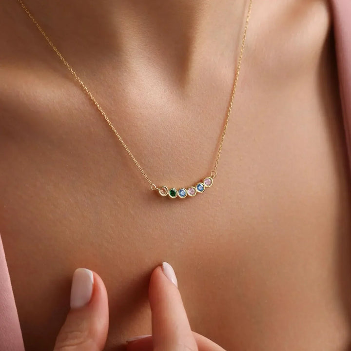 Loved Ones Birthstone Necklace, shown on the model