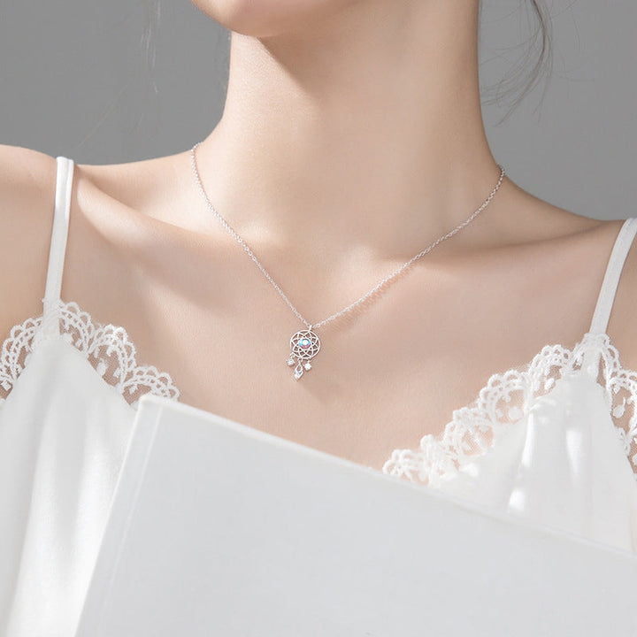 Dream Catcher Necklace, shown on the model