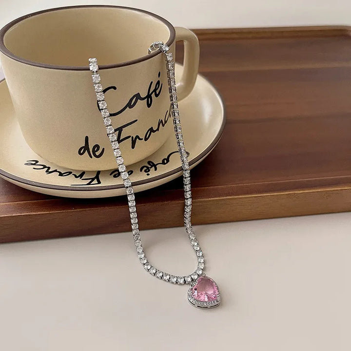 Pink Crystal Heart Pendant, shown on the model