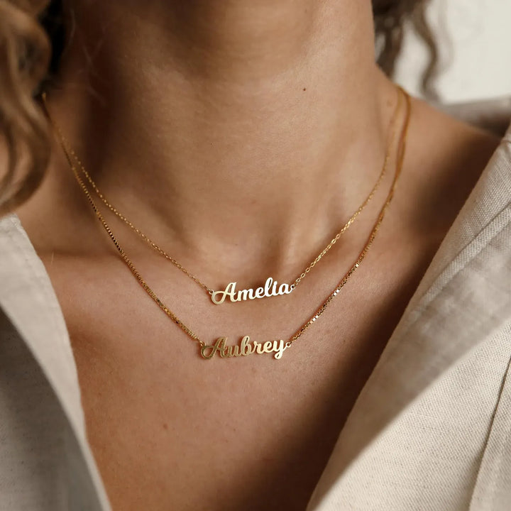Firma Name Necklace, close-up while worn