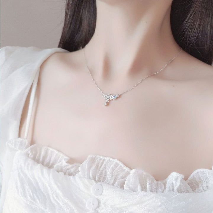Aurora Snowflake Necklace, worn at the neckline