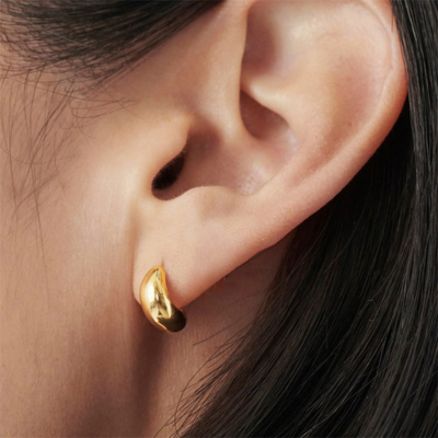 Velia Earrings, worn on the ear