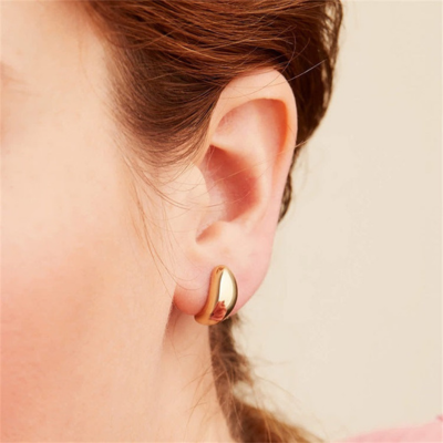 Velia Earrings, close-up on the ear