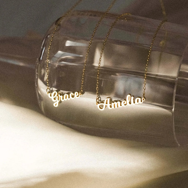 Firma Name Necklace, styled on the model
