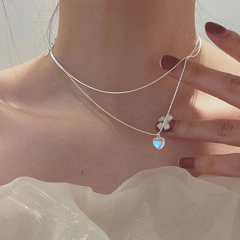 Moonstone Heart Necklace, close-up while worn