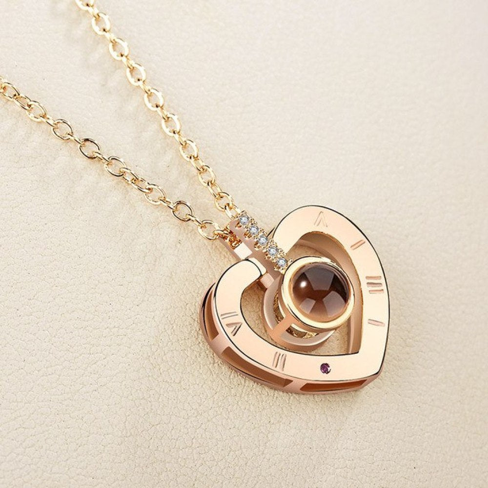 I Love You In 100 Languages Necklace, shown on the model