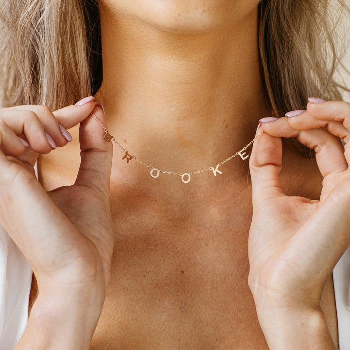 Sofia Personalised Name Necklace, worn at the neckline 2