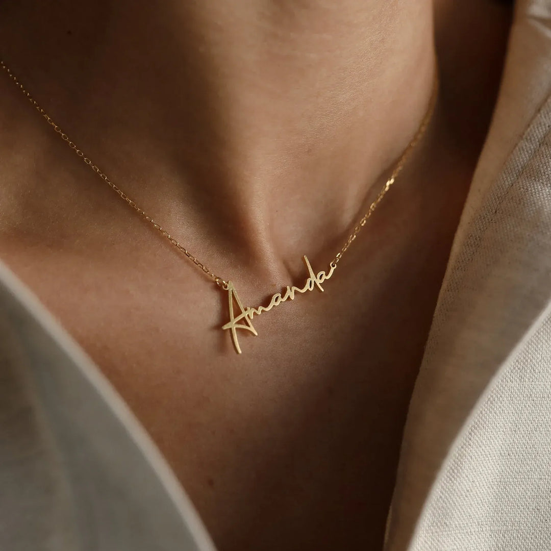 Connection Name Necklace, shown on the model 2