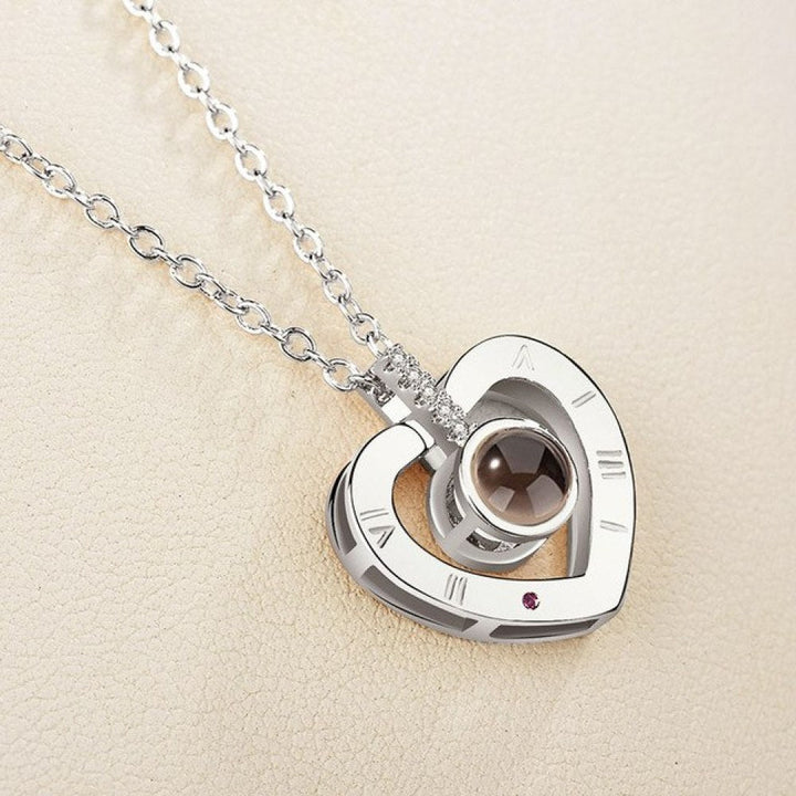 I Love You In 100 Languages Necklace, worn at the neckline
