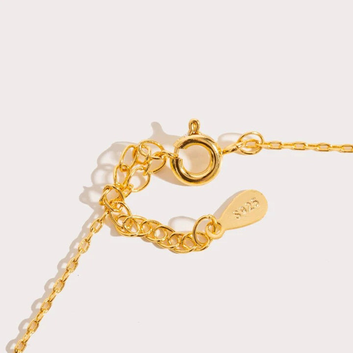 White Opal Heart Necklace, shown on a plain background