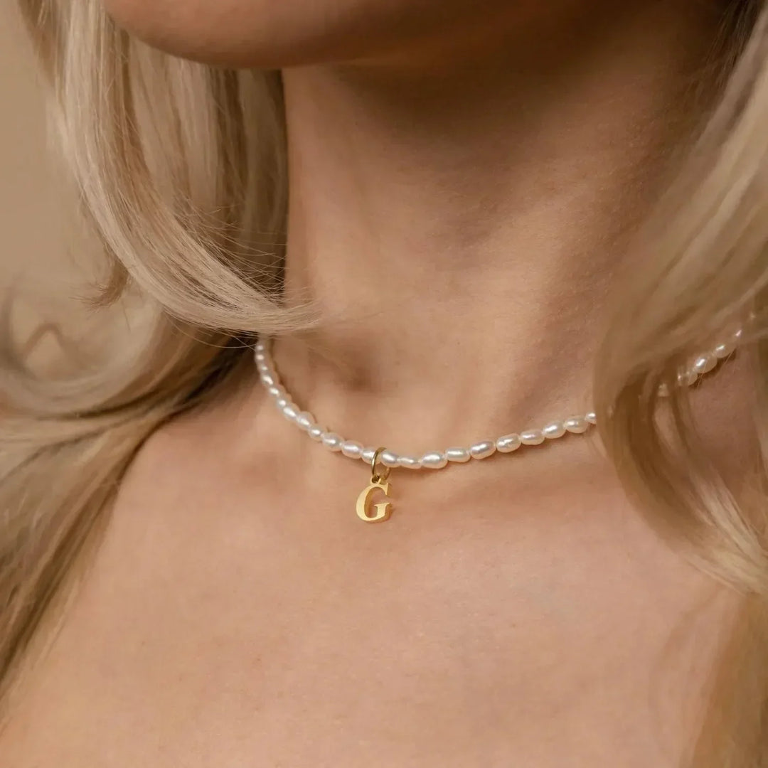 Elora Pearl Initial Necklace, worn at the neckline