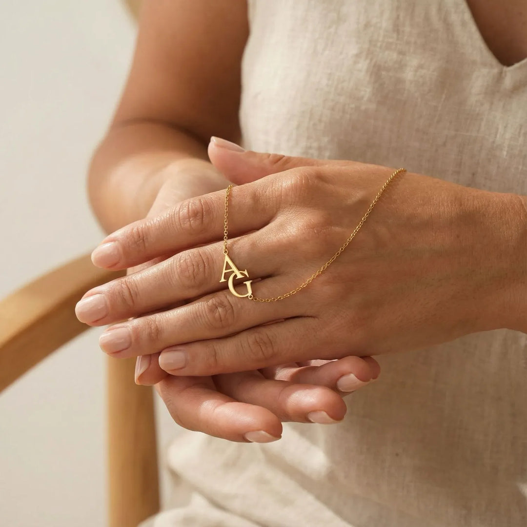 Alovia Initials Necklace, shown on the model 2