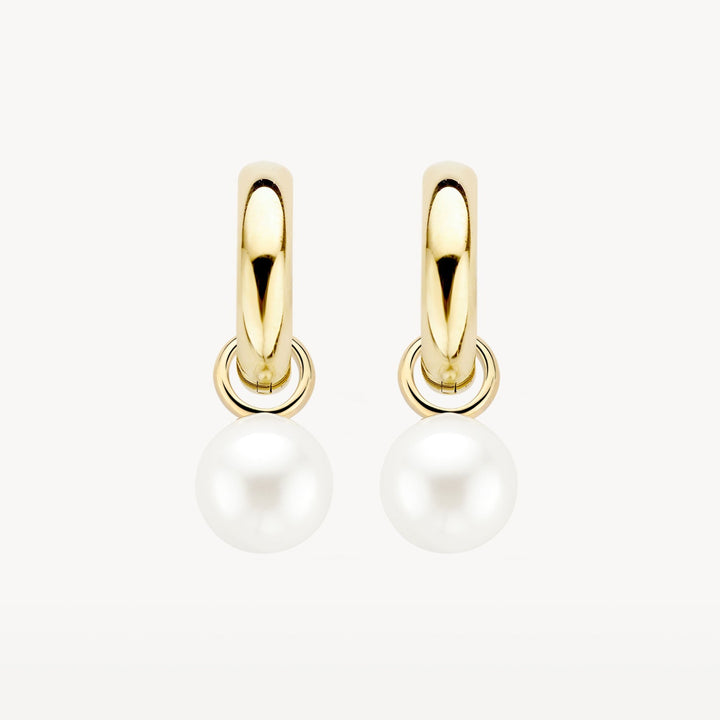 Livia Pearl Earrings in gold, shown on a plain background