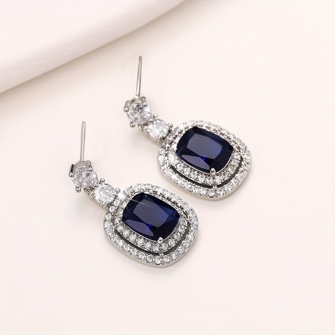 Oval Sapphire Earrings with Pavé Zirconia Accents