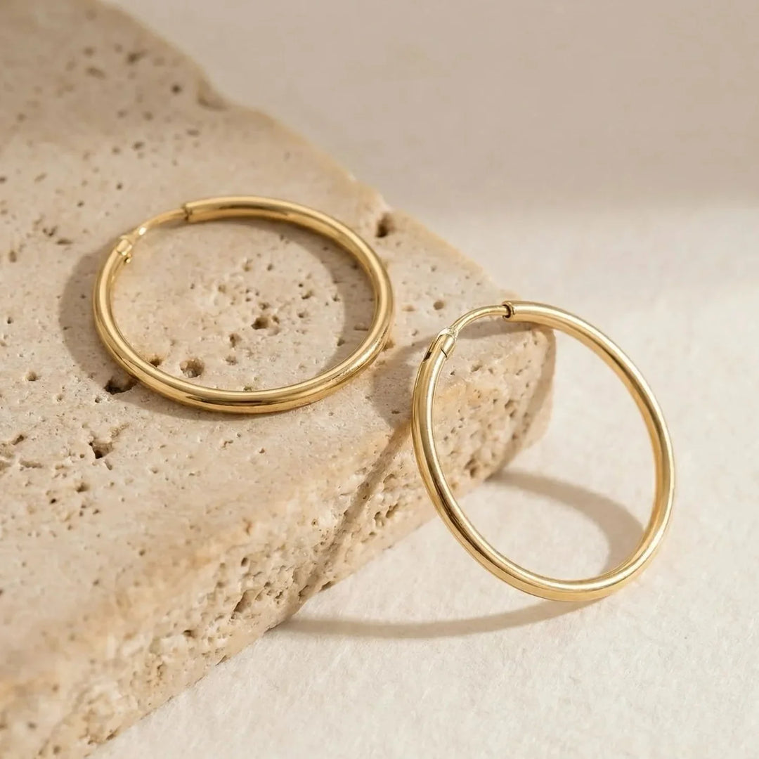 Aby Hoop Earrings, worn on the ear
