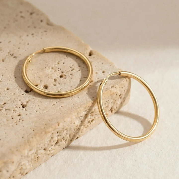 Aby Hoop Earrings, worn on the ear