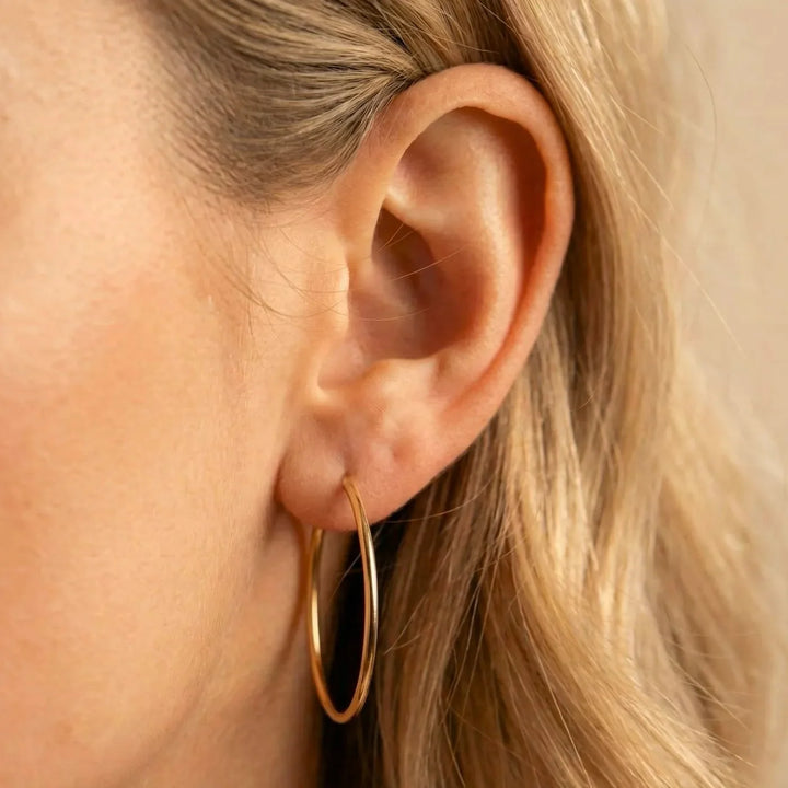 Aby Hoop Earrings, styled on the model