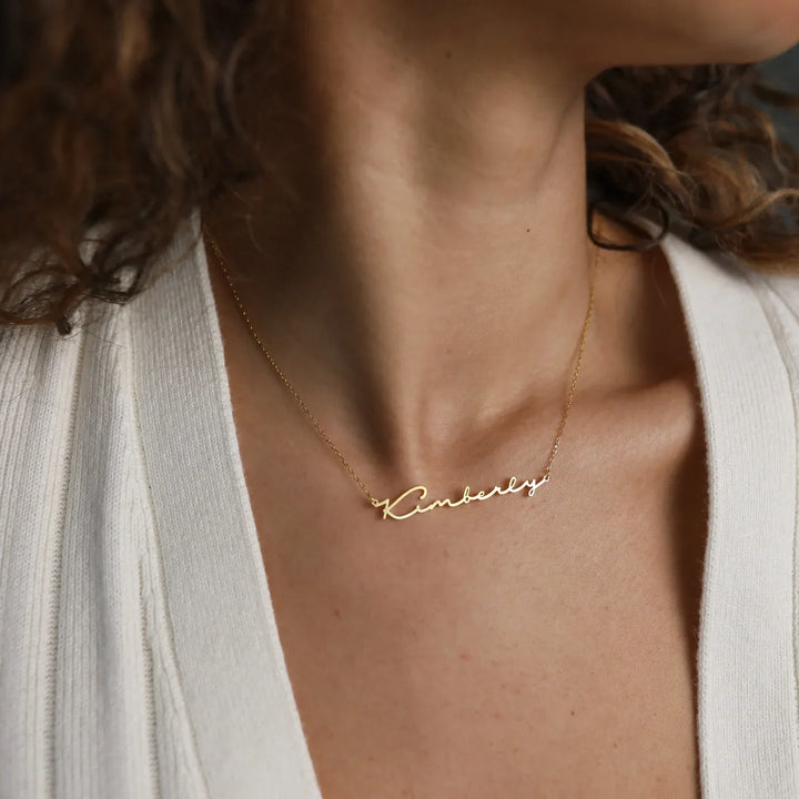 Connection Name Necklace, styled on the model