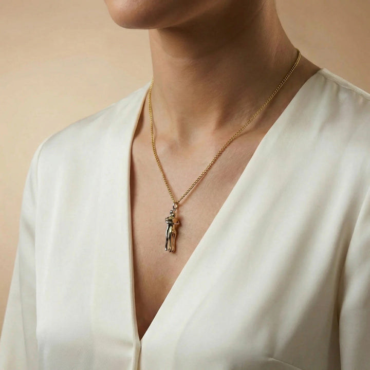 Loves Embrace Necklace, shown on the model 2