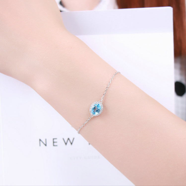 Blue Topaz Bracelet, shown on a plain background