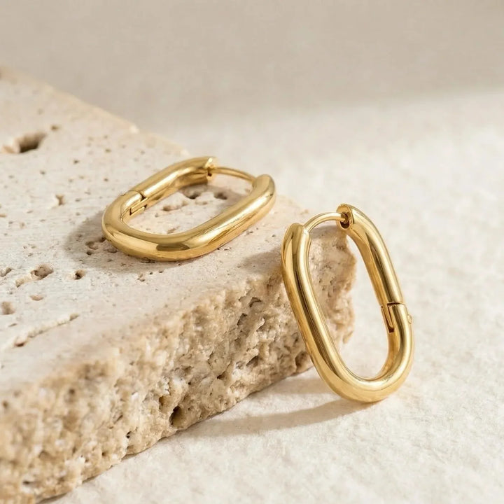 Vialo Earrings, shown on the model