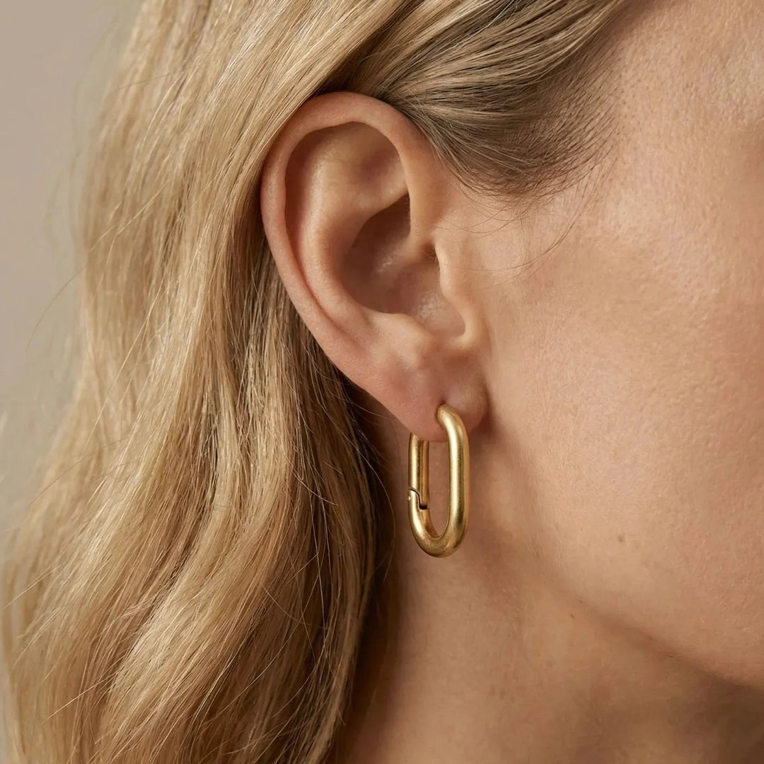 Vialo Earrings, worn on the ear