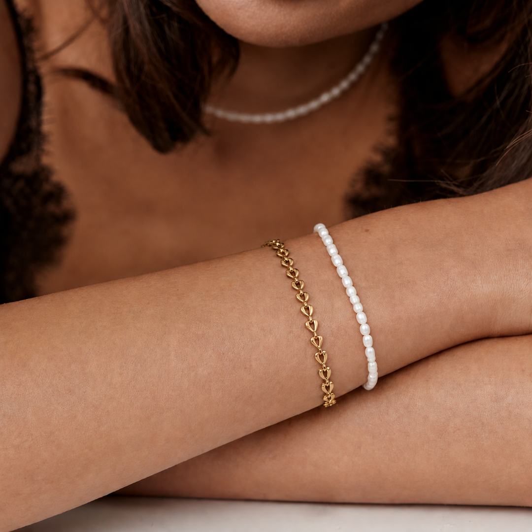 Essential Pearl Bracelet in gold, close-up on the wrist