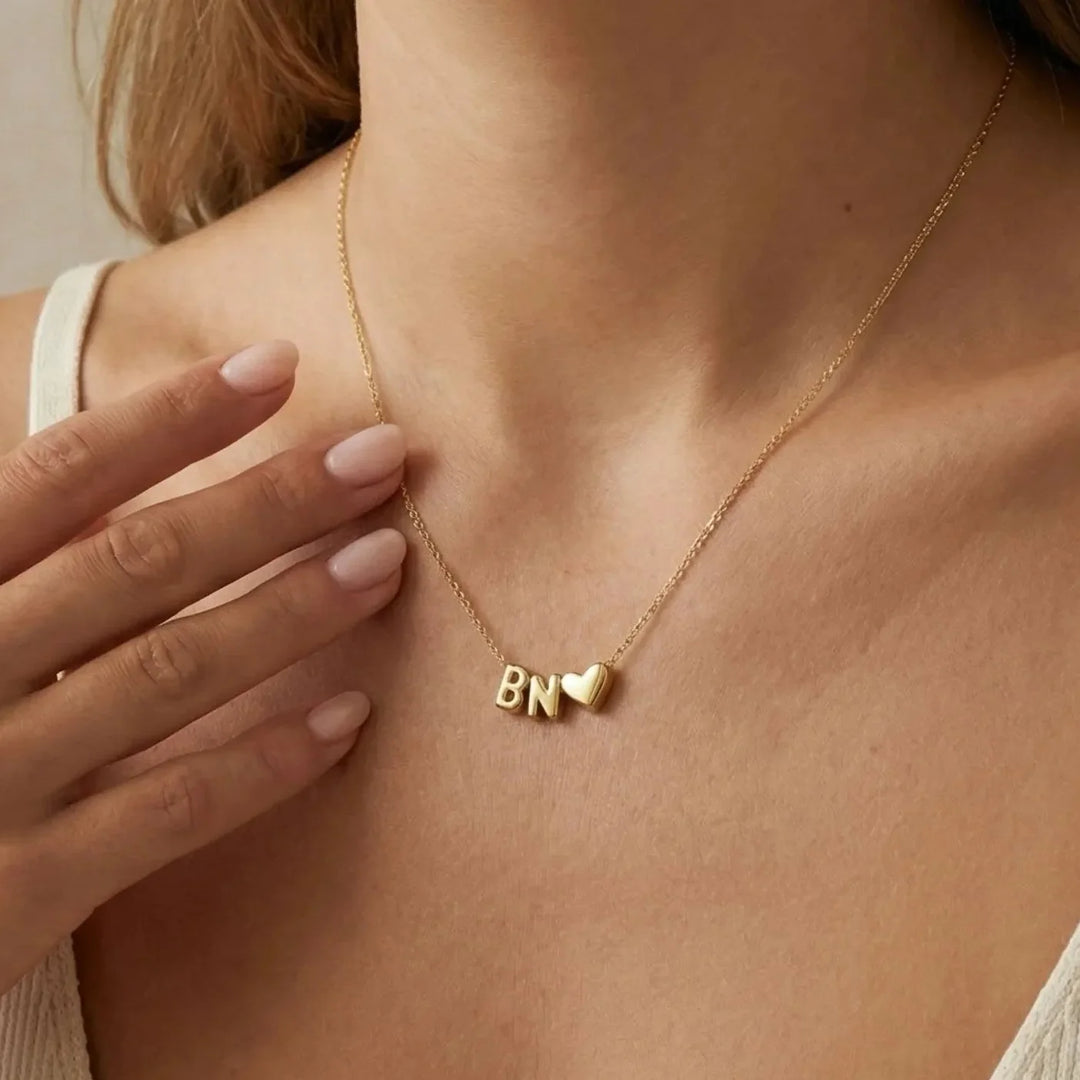 Lovia Balloon Letter Necklace, styled on the model