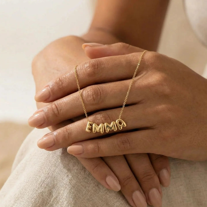 Lovia Balloon Letter Necklace, close-up while worn