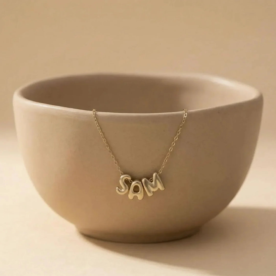Lovia Balloon Letter Necklace, worn, side view