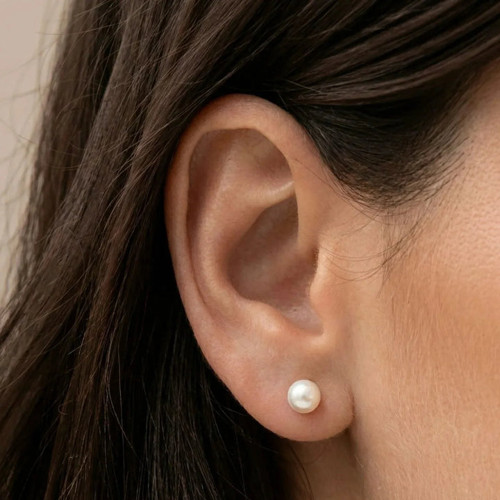 Gioia Earrings, worn on the ear