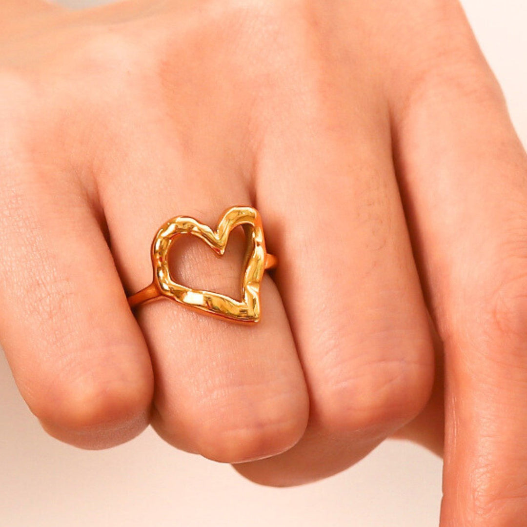 Aurea Heart Ring, shown on the model