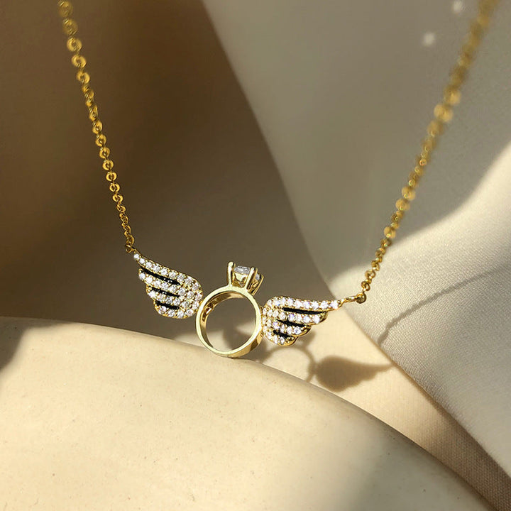 Angel Wings Ring Necklace, shown on the model