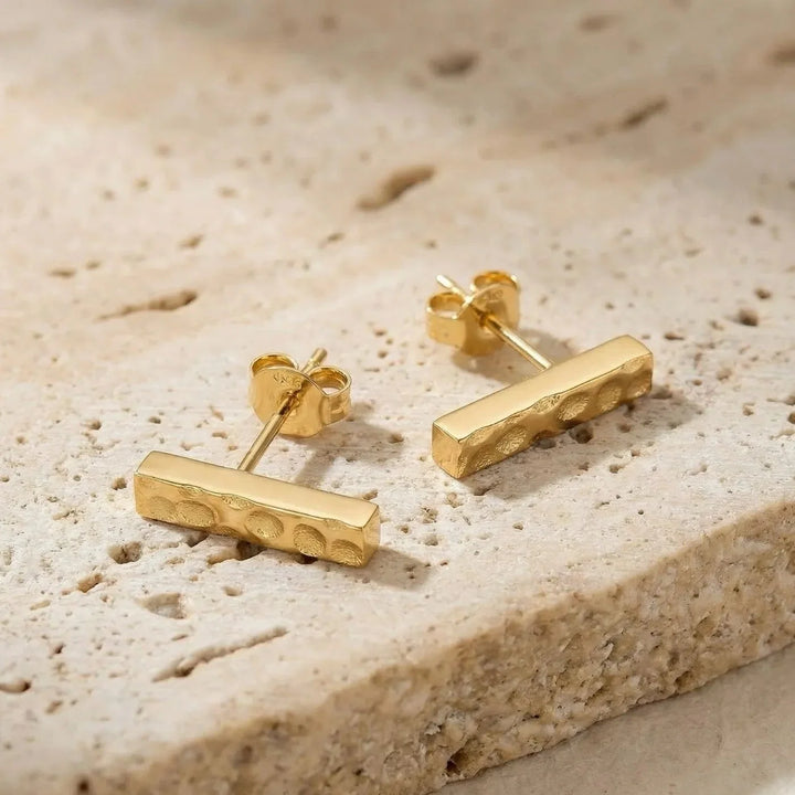 Jasia Stud Earrings, styled on the model