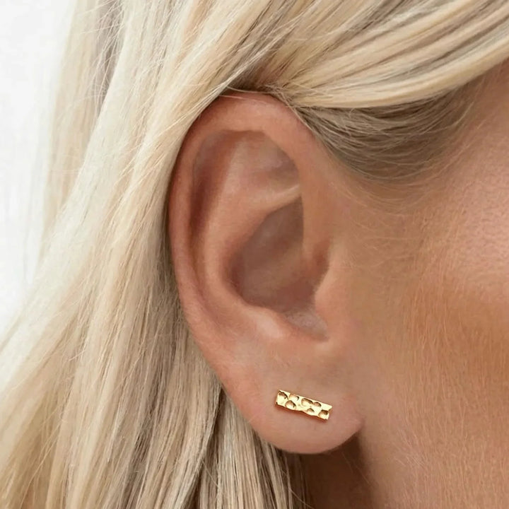 Jasia Stud Earrings, close-up on the ear