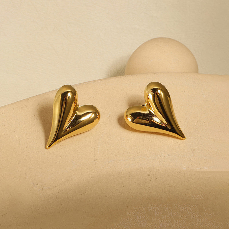 Love Heart Earrings, worn on the ear
